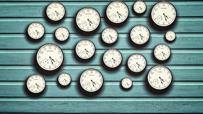 stockvault-many-clocks-in-a-blue-wooden-background178073
